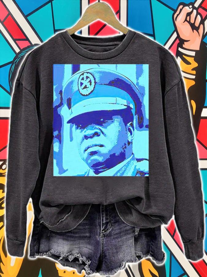 Idi Amin Dada in blues T-shirt